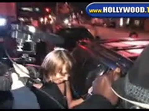 Cheryl Burke Leaves Villa.