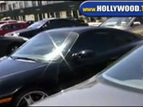 Ellen DeGeneres and Portia de Rossi Leaving Sunset PLaza.