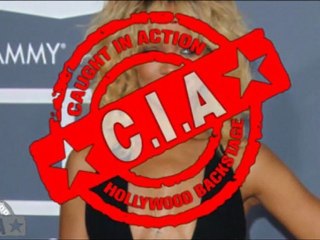 Rihanna looking HOT in a Revealing Black Dress