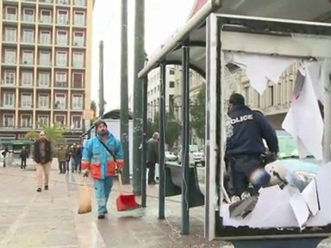 Athens smoulders after blazing protests over austerity