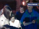 Anne Hathaway Signs Autographs for Fans At Wiltern Theatre.