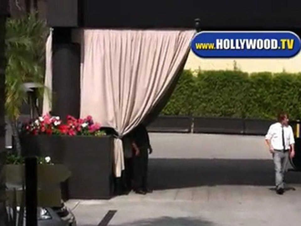 Jessica Biel Hides From Camera At Roosevelt Hotel.