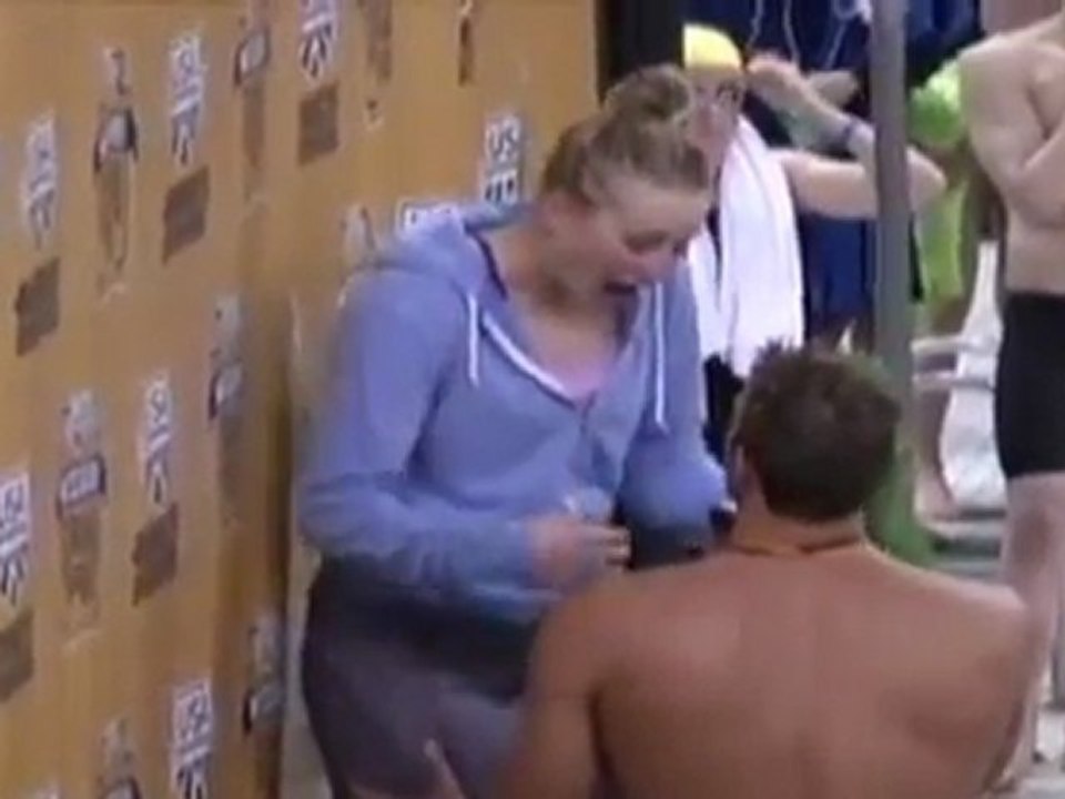 Olympic Swimmer Propses on Medal Stand