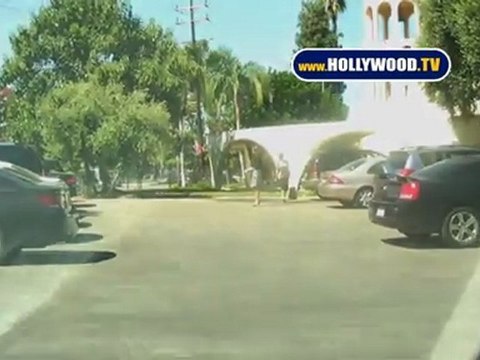 Oksana Exits a Greek Catholic Church on Sunday