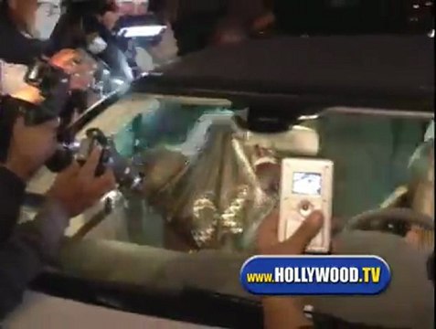 Britney Spears and Posse Run Over Paparazzi