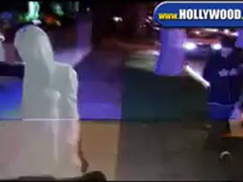 Paris Hilton and Yogi At Raffles L 'Ermitage Hotel.