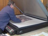 Atelier de laminage, production de plaques murales d'équipes sportives.