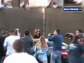 Lindsay Lohan Drives Thru Photographers At Maxfield's