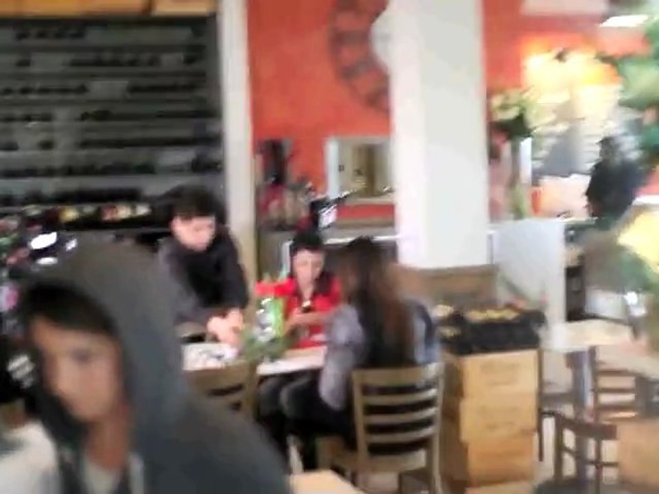 Kim and Kourtney Kardashian Brave the Rain in L.A.