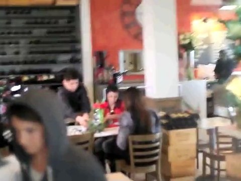 Kim and Kourtney Kardashian Brave the Rain in L.A.