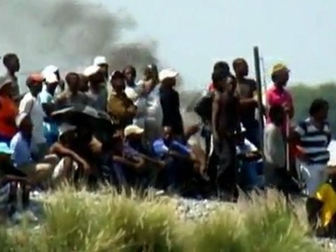 S. African police disrupt striking miners' protest