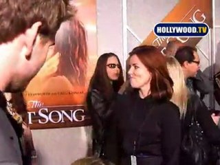 Miley Cyrus And Liam Hemsworth At "The Last Song" Premiere