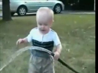 Little kid tries to drink water!