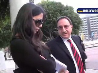 Oksana Returns to Battle With Mel in Court