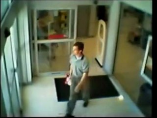 Guy Walks Into Glass Window