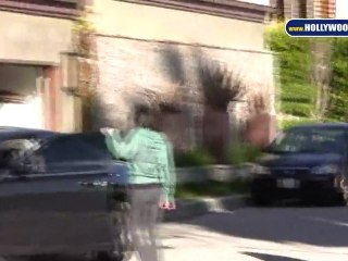 EXCLUSIVE: Oksana Grigorieva Pulls Car Inside Garage