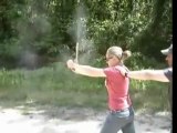 Chick almost shoots herself!!!
