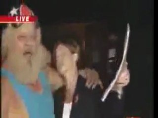 Reporter Gets Surprise Kiss