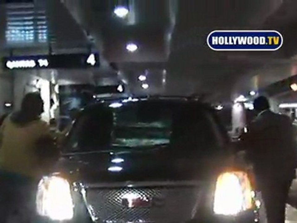 Jessica Simpson And Ken Paves At LAX