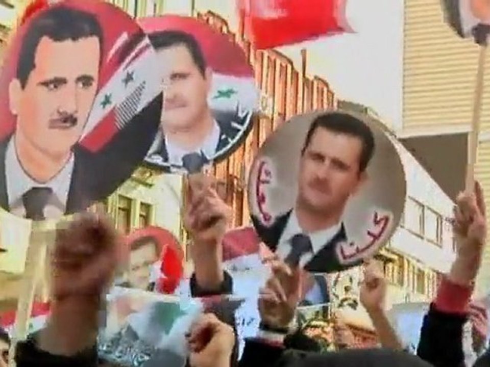 Hundreds rally in support of Syria's Assad