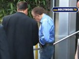 Larry King Signs Autographs For Fan