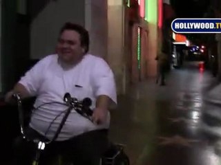 Preston Lacy riding his bicycle in Hollywood Blvd.