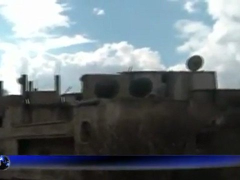 Syrian flashpoint city Homs pounded for 15th day