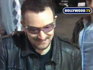U2 Sign Autographs and Take Photos With Fans.
