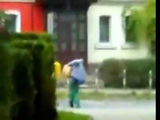 Drunk guy can barely walk, falls in street