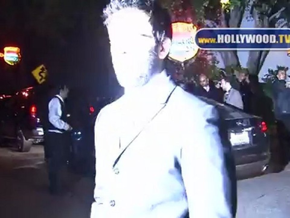 Eli Roth and Jaime Pressly leave GQ's 2011 "Men of the Year" Party