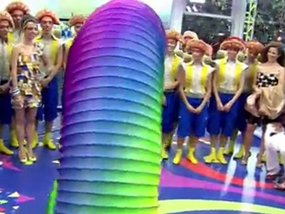Reporter swallowed by Human Slinky ~ Rio Carnival 2012