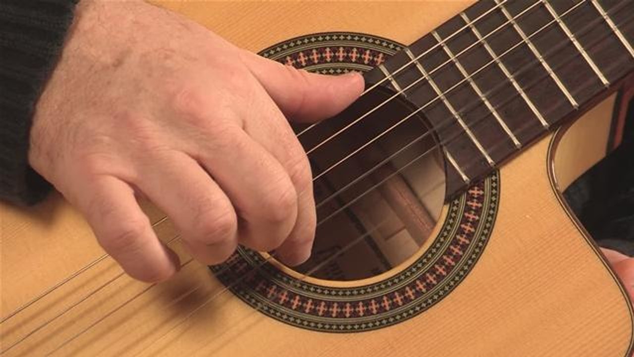 How To Strum A Spanish Guitar video Dailymotion