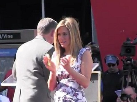 Jennifer Aniston and Justin Theroux Share Kiss as She's Awarded Walk of Fame Star