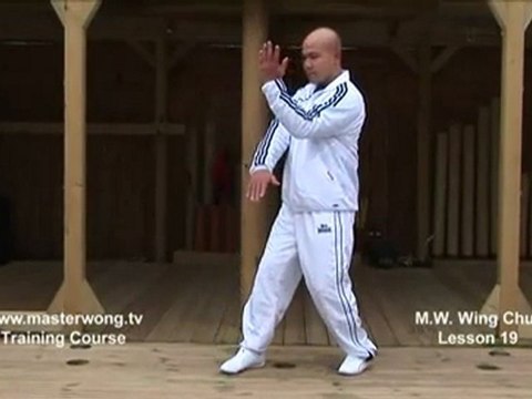 How to do Wing Chun Lesson 19- basic hand exercise_ static blocking for high kicks