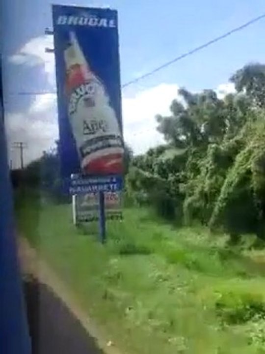On the highway between Santiago and Puerto Plata city in a Metrobus.