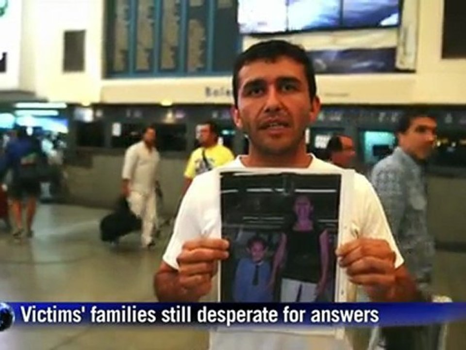 Argentinians return to train station after disaster