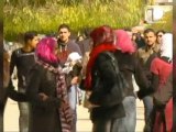 Syrians vote as bombs rain down