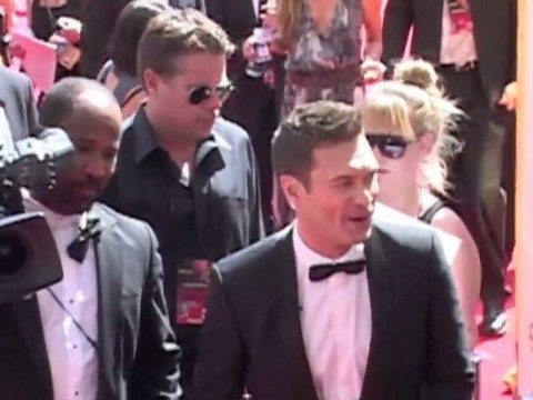 Sacha Baron Cohen's Dictator Spills Ashes on Ryan Seacrest at Oscars