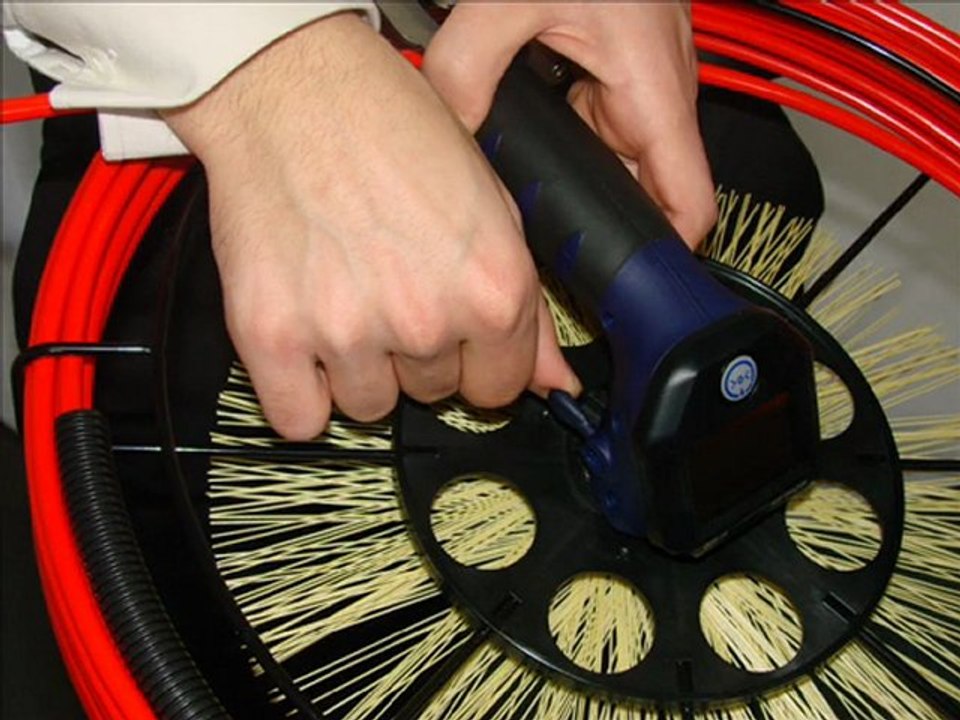 Canne de ramonage sur enrouleur