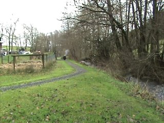 Spanische fünf Zoll Lok auf Bergfahrt im Huserland