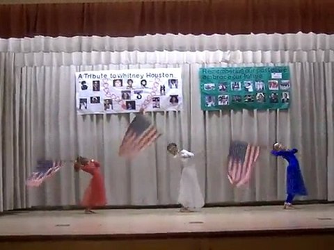 The Williams Dancers Perform to The Star Spangled Banner , sung by Whitney Houston