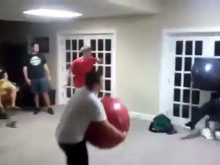 Exercise Ball Sends Kid Through Door