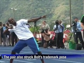 Prince Harry gets a jump on Jamaica's Usain Bolt