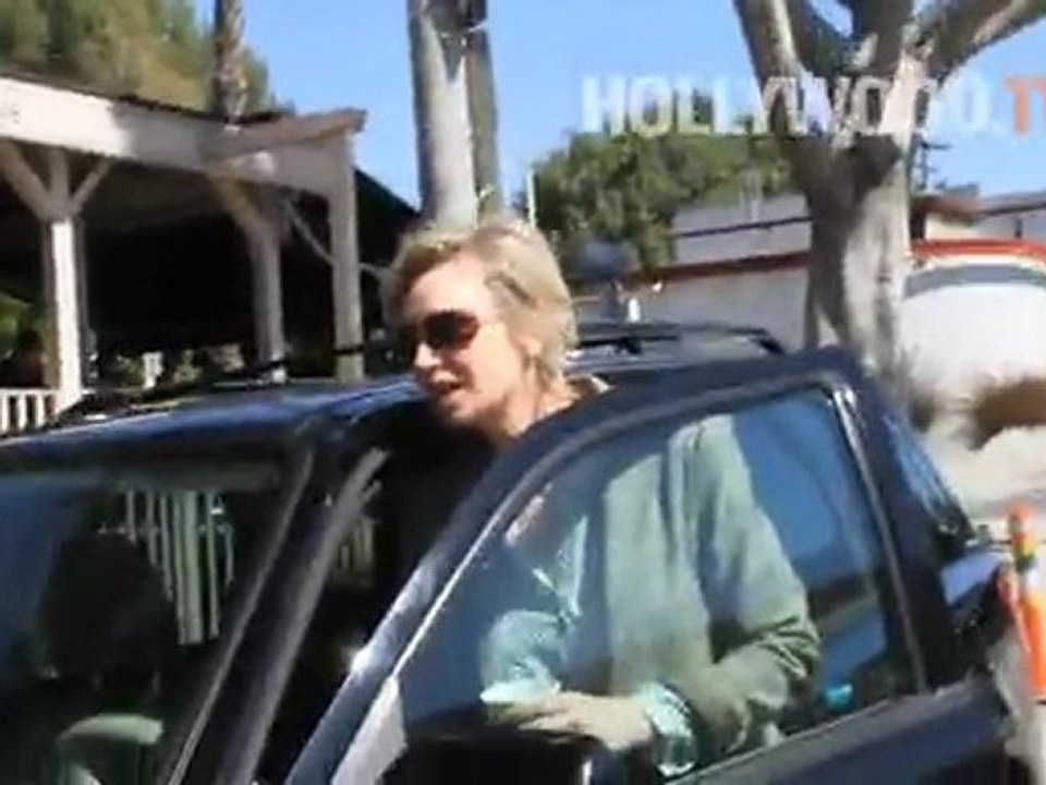 Jane Lynch grabs a coffee.