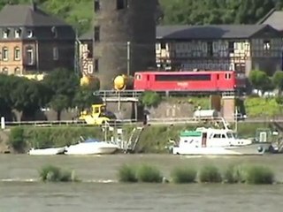 Trains and ships near the town of Kaub beside the river Rhine