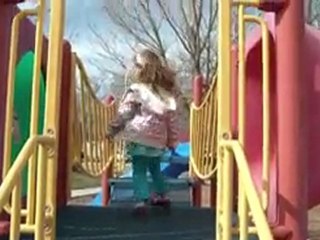 Jonah going down the slide