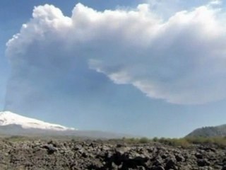 Plumes of black smoke erupt from Mount Etna