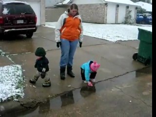 Kid Faceplants Into Puddle !