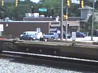 N.S. train meet in Austell Ga. one container and auto carrier heading southeast and one container train into Whitaker Yard.