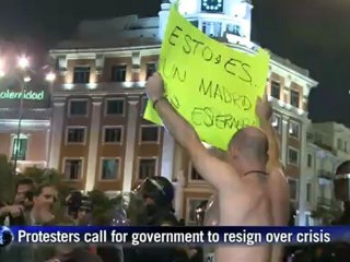 Spanish police beat protesters near parliament